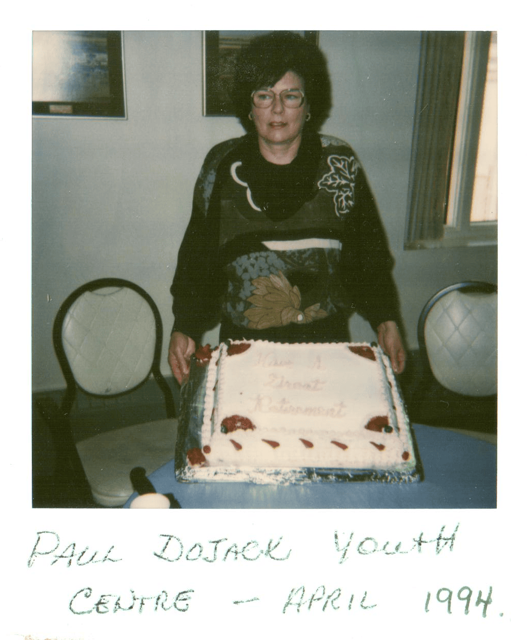 Betty holding a Cake celebrating her retirement from the Paul Dojack Youth Centre - April 1994